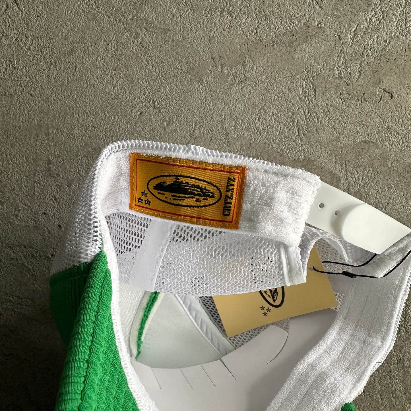 Corteiz Short Peak Trucker Cap