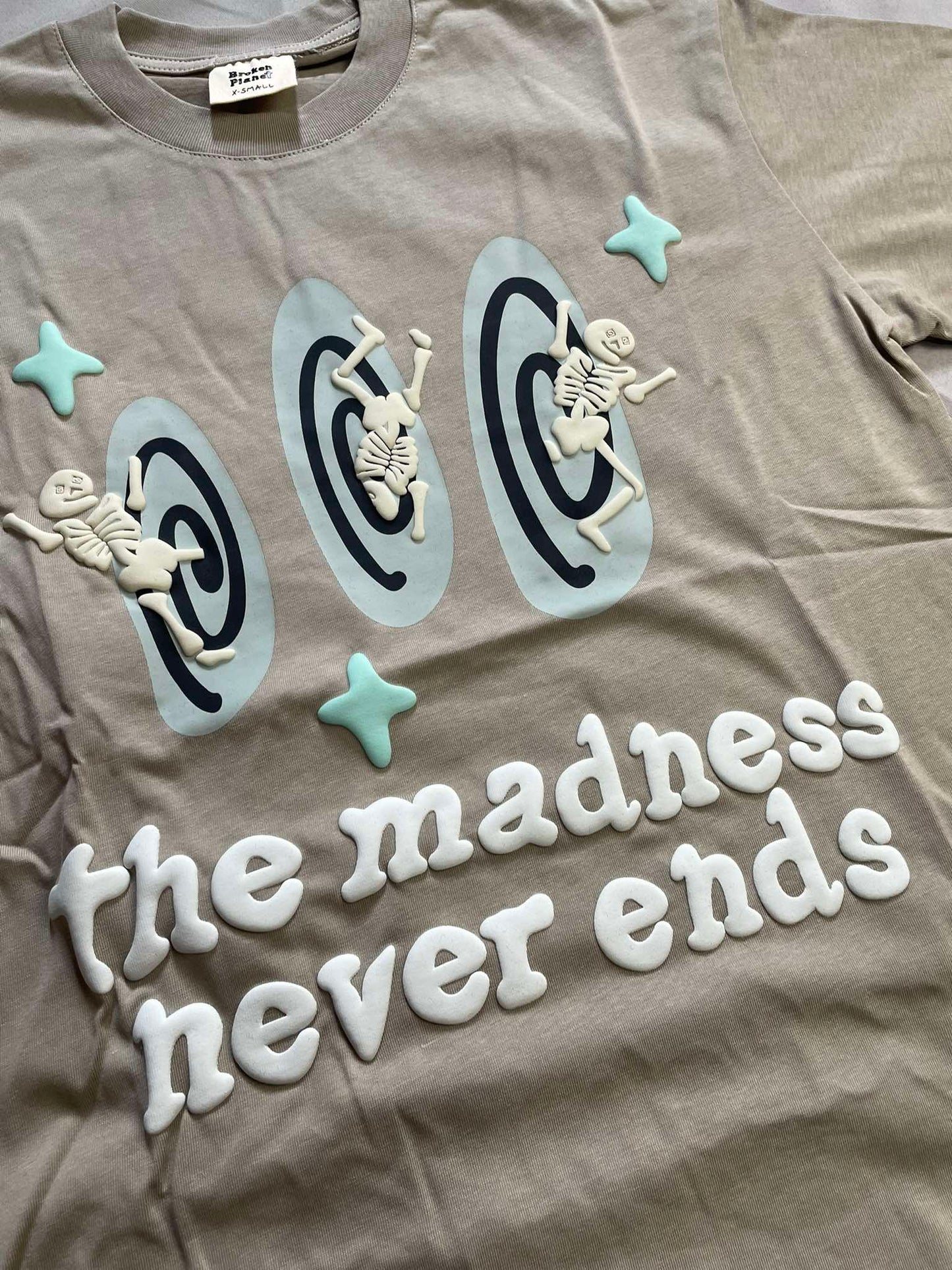 Broken Planet 'The madness never ends' Tee