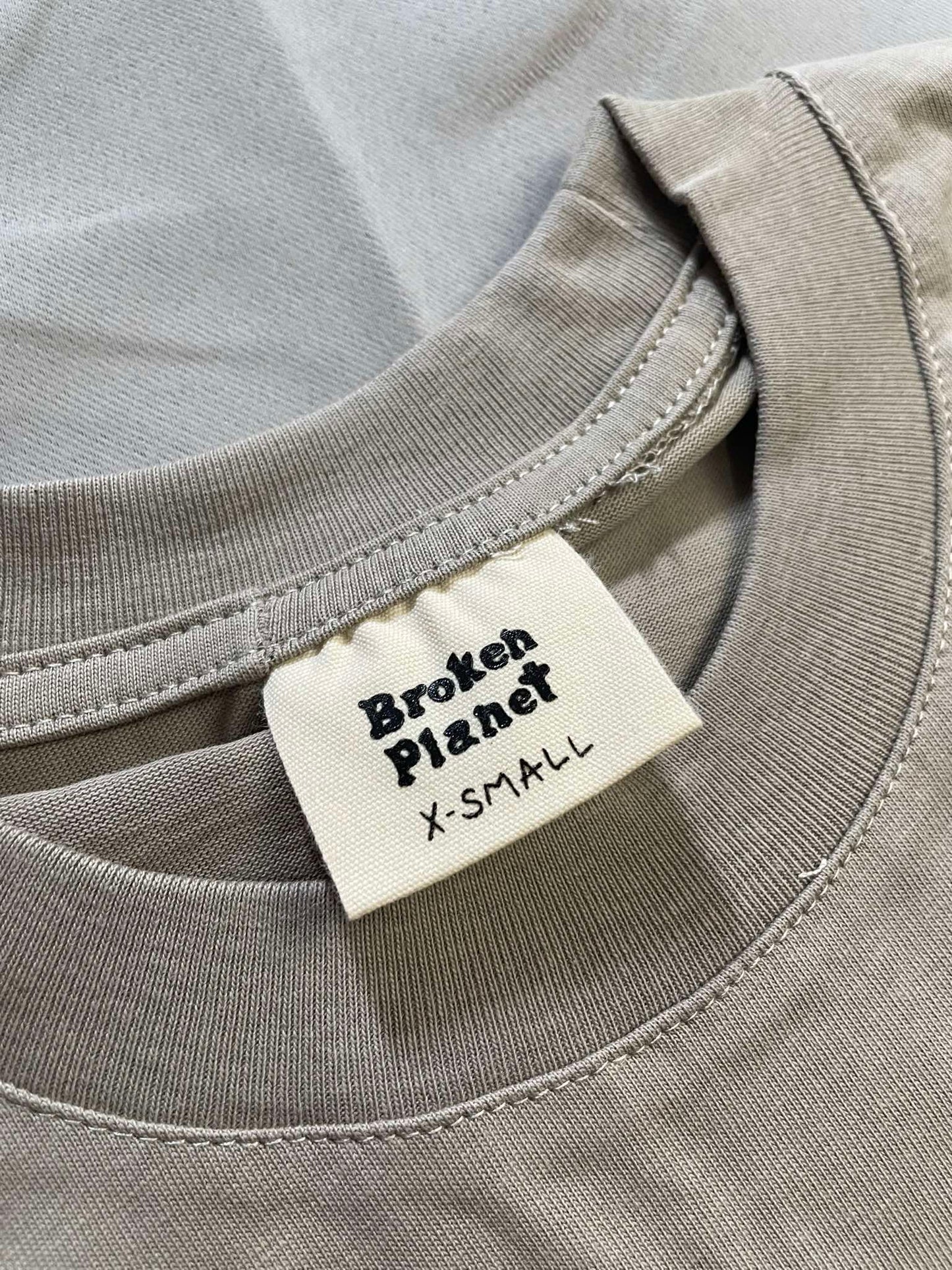 Broken Planet 'The madness never ends' Tee