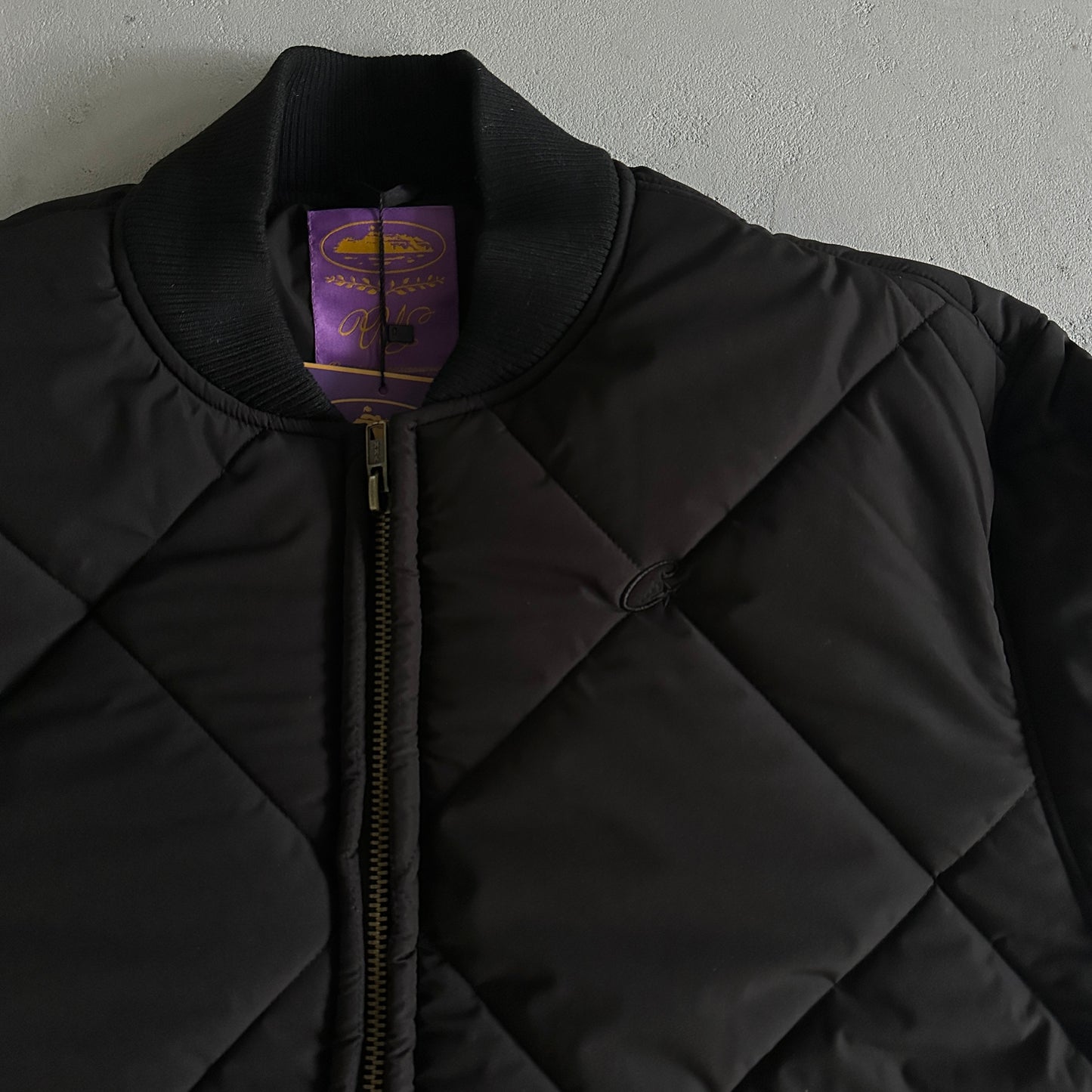 Corteiz Olde English Quilted Jacket