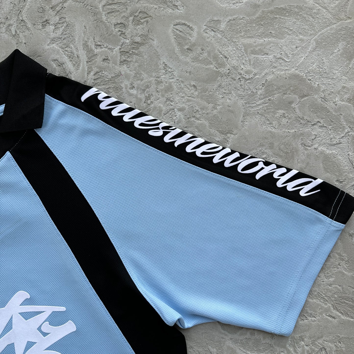 Corteiz Blue Panel Jersey Tee