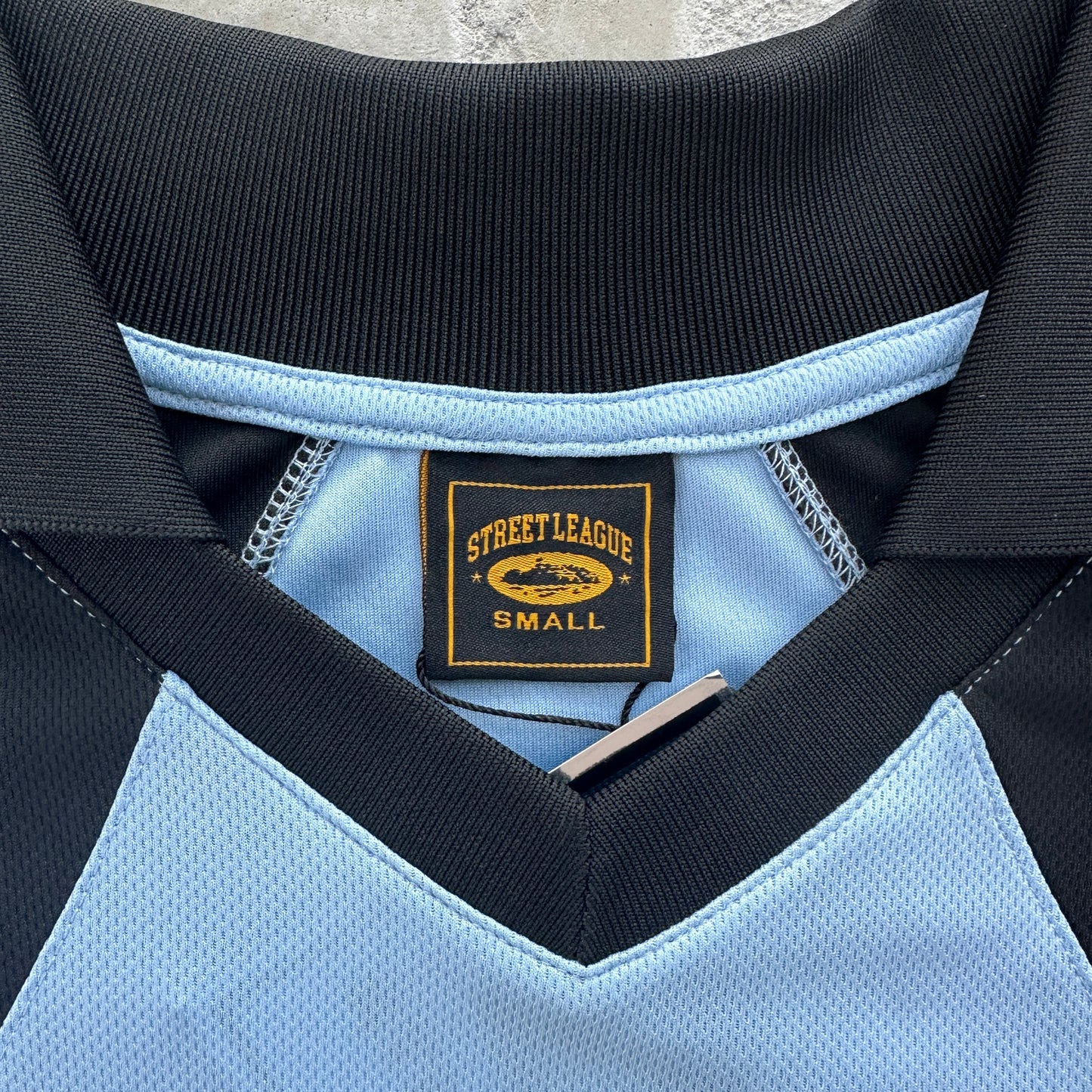 Corteiz Blue Panel Jersey Tee