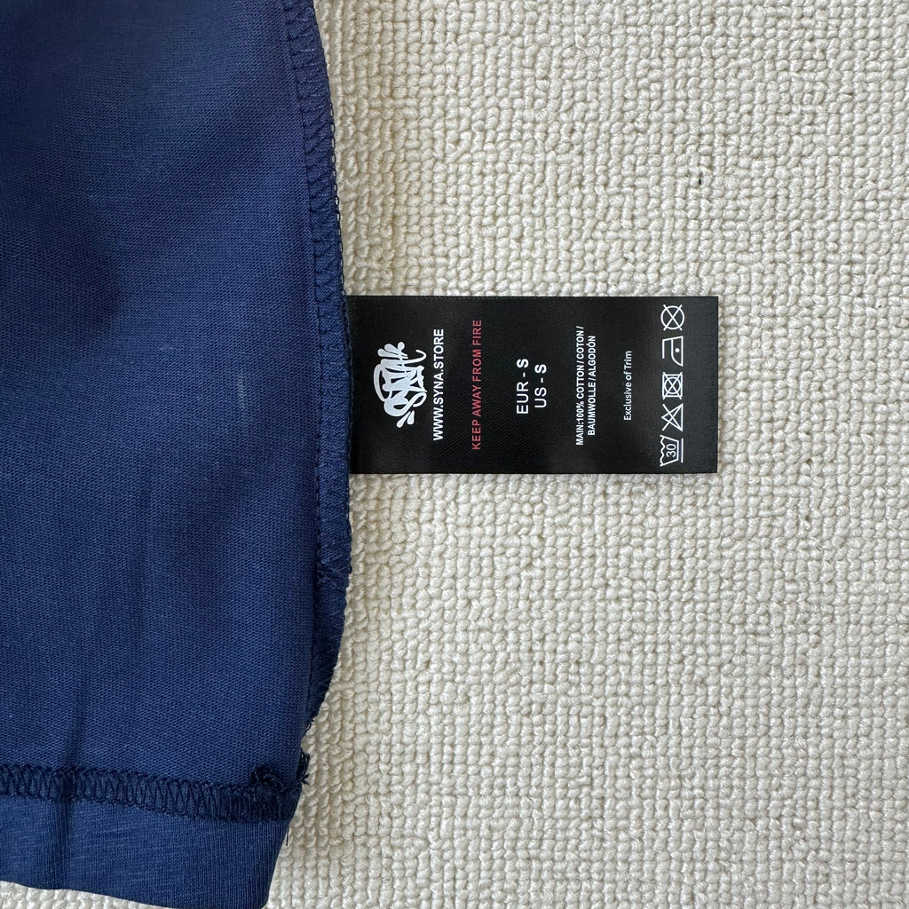 Syna World Crest Tee