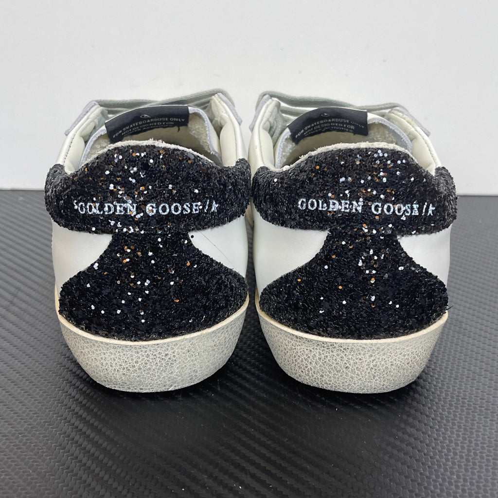 Women's Golden Goose Super-Star Golden Star and black glitter heels tab