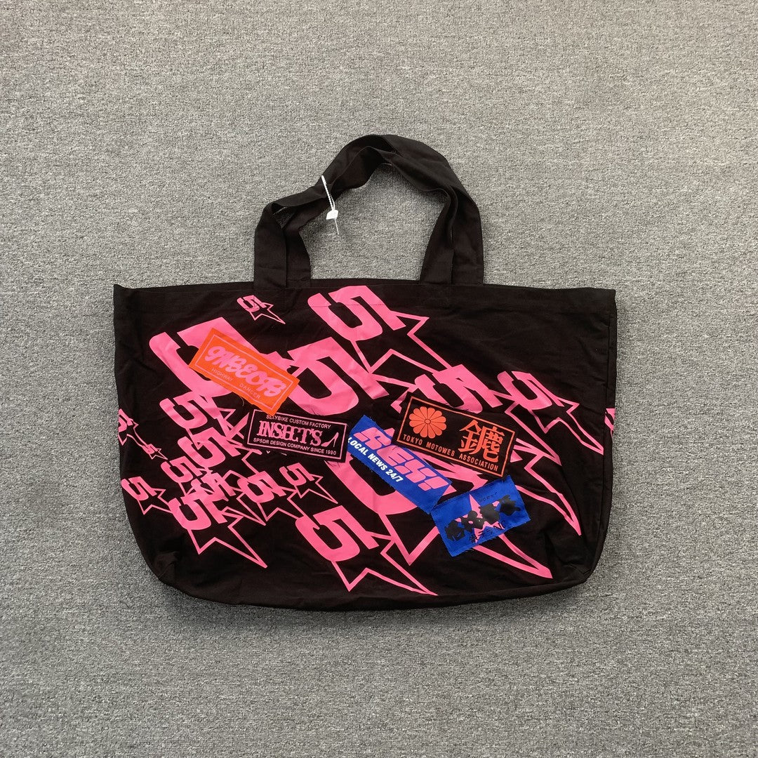 SP5DER Tote bags