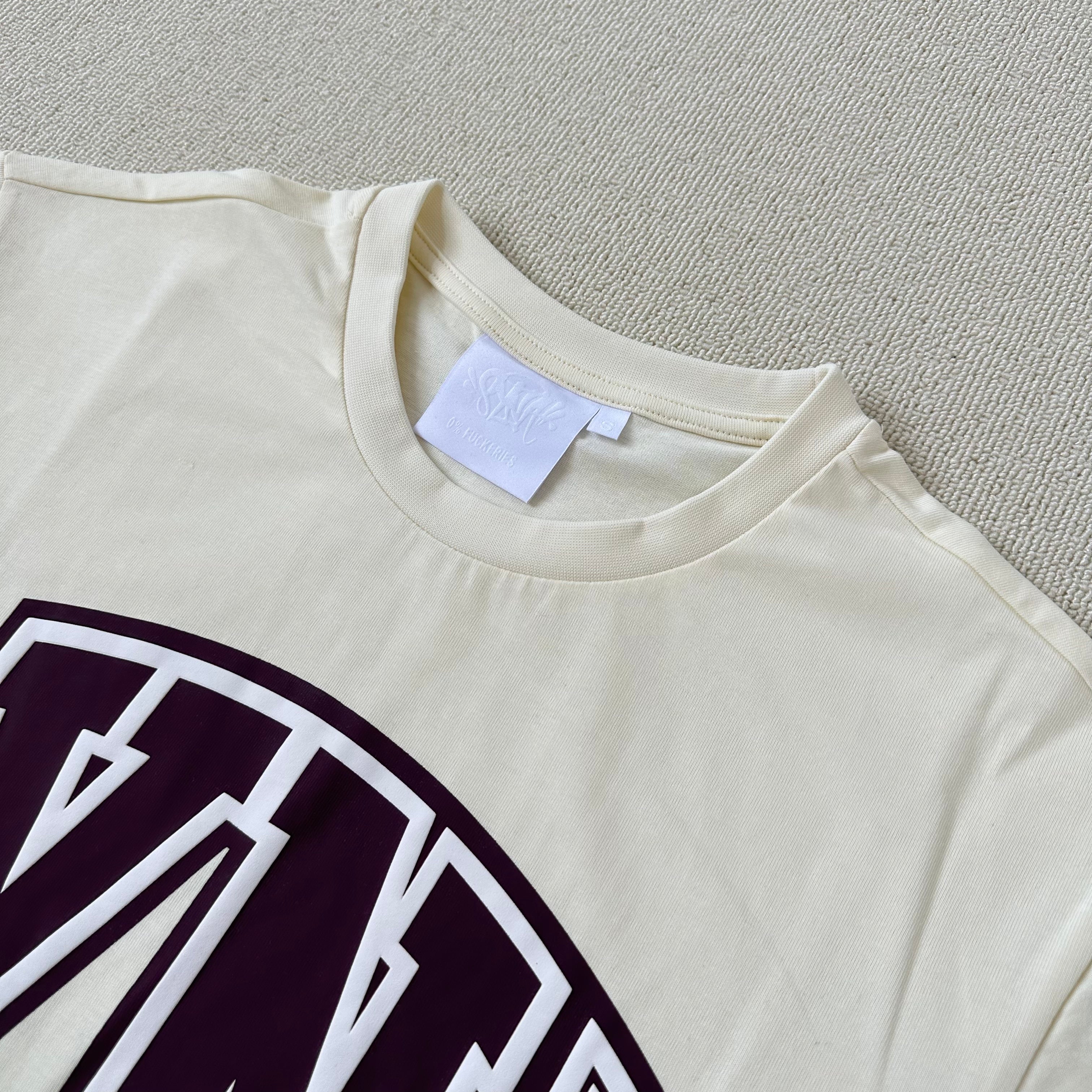 Syna World Crest Tee