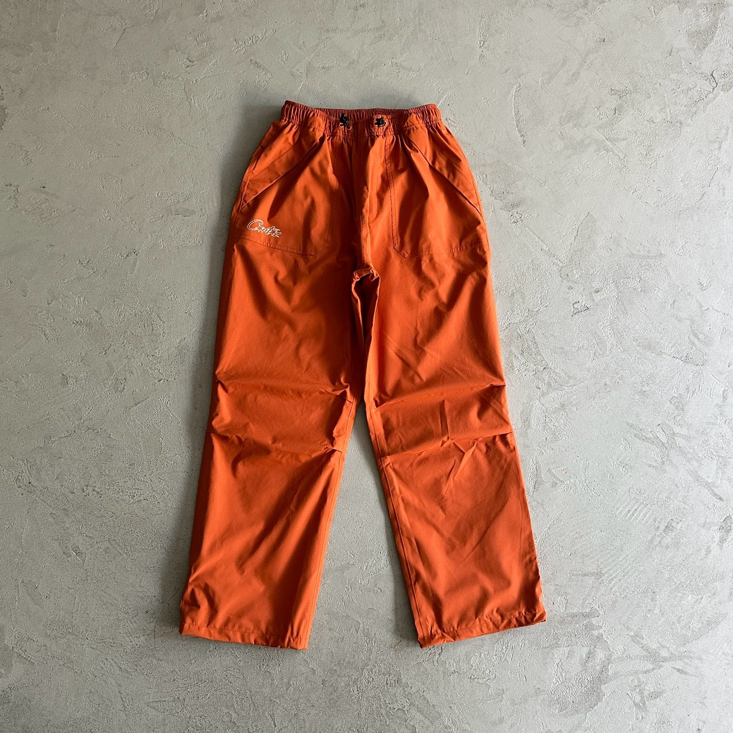 Corteiz Gutta Waterproof Bottoms Burnt Orange Tracksuit
