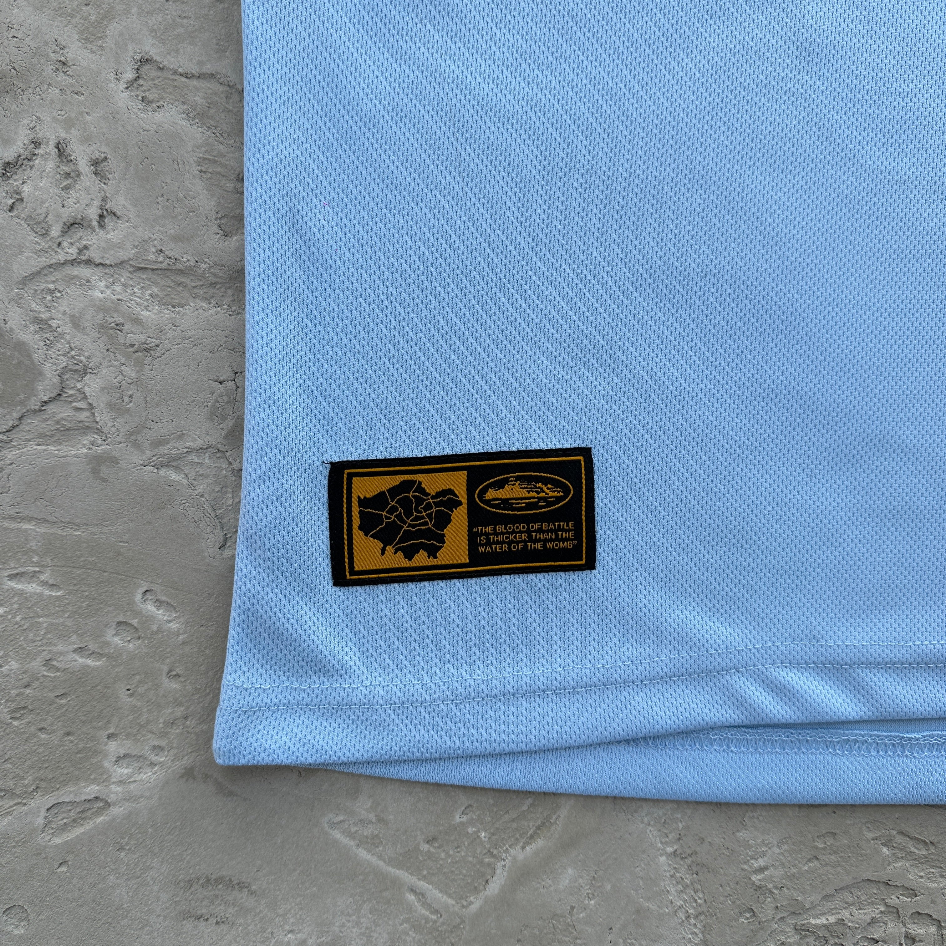 Corteiz Blue Panel Jersey Tee