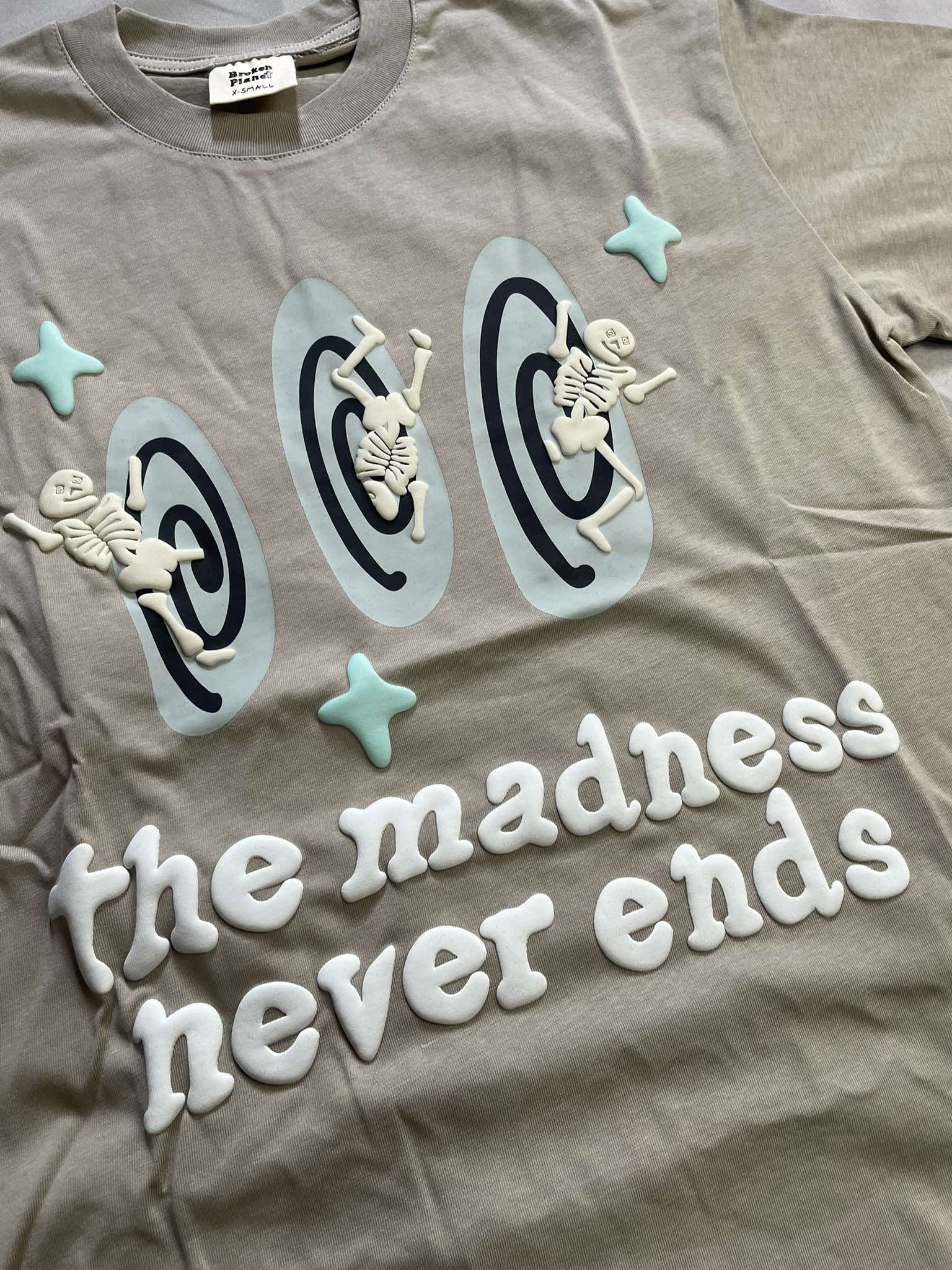 Broken Planet 'The madness never ends' Tee