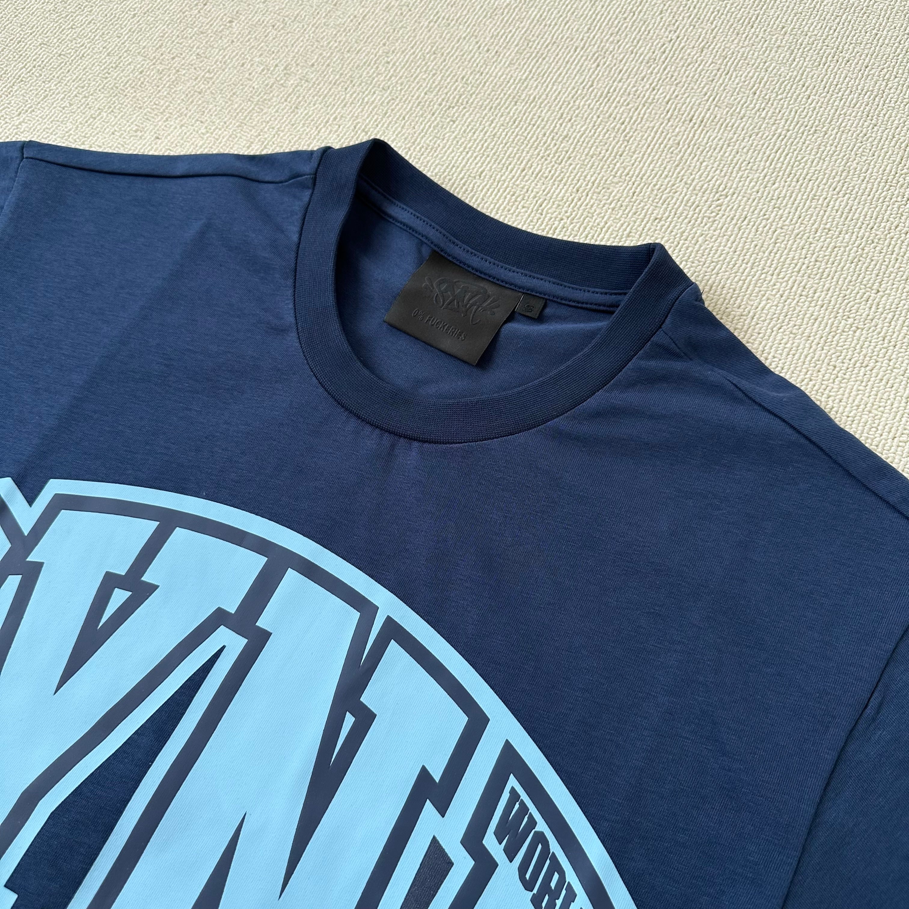 Syna World Crest Tee