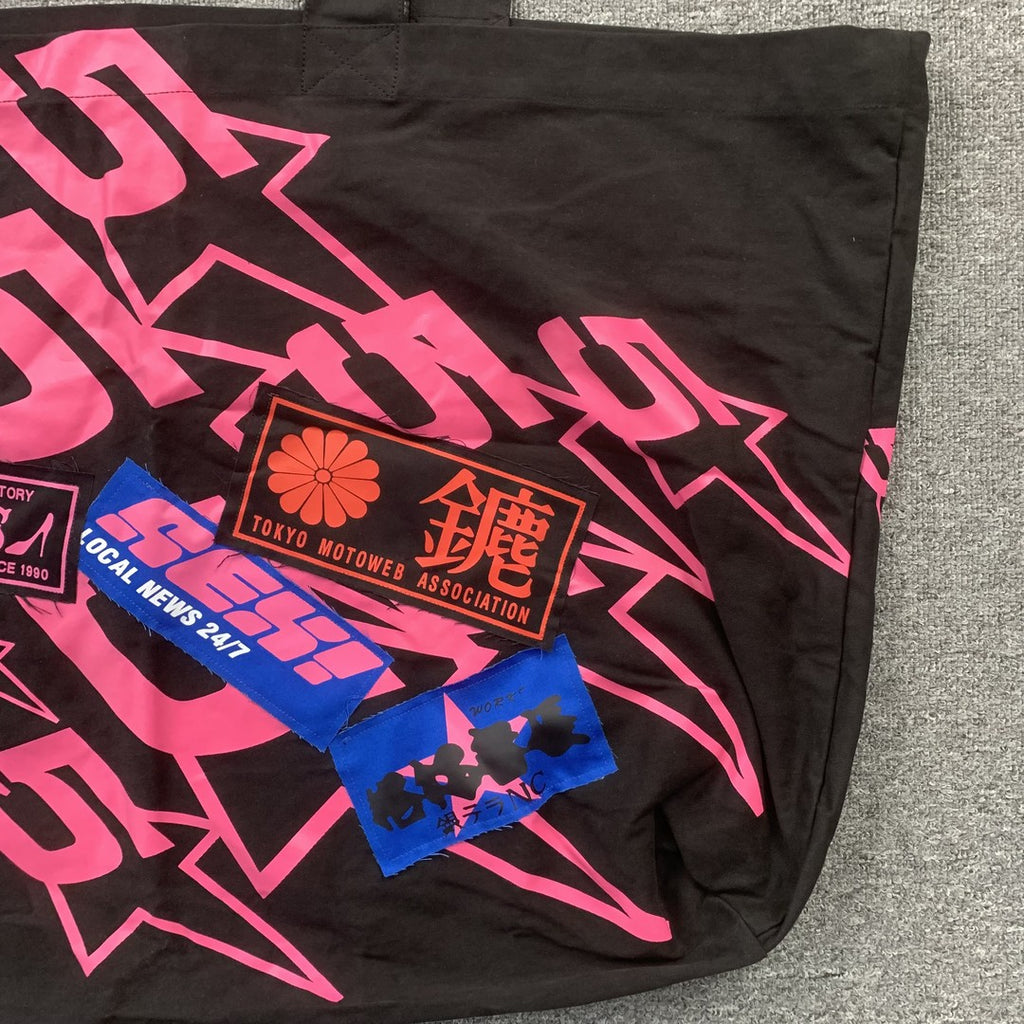 SP5DER Tote bags