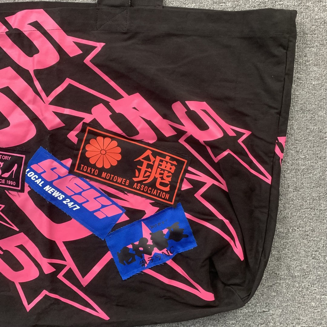 SP5DER Tote bags