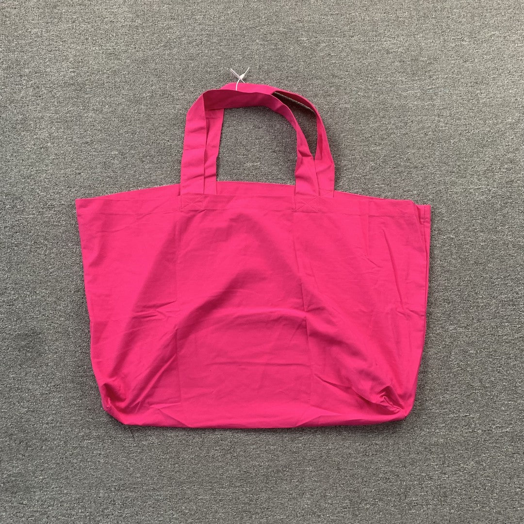 SP5DER Tote bags