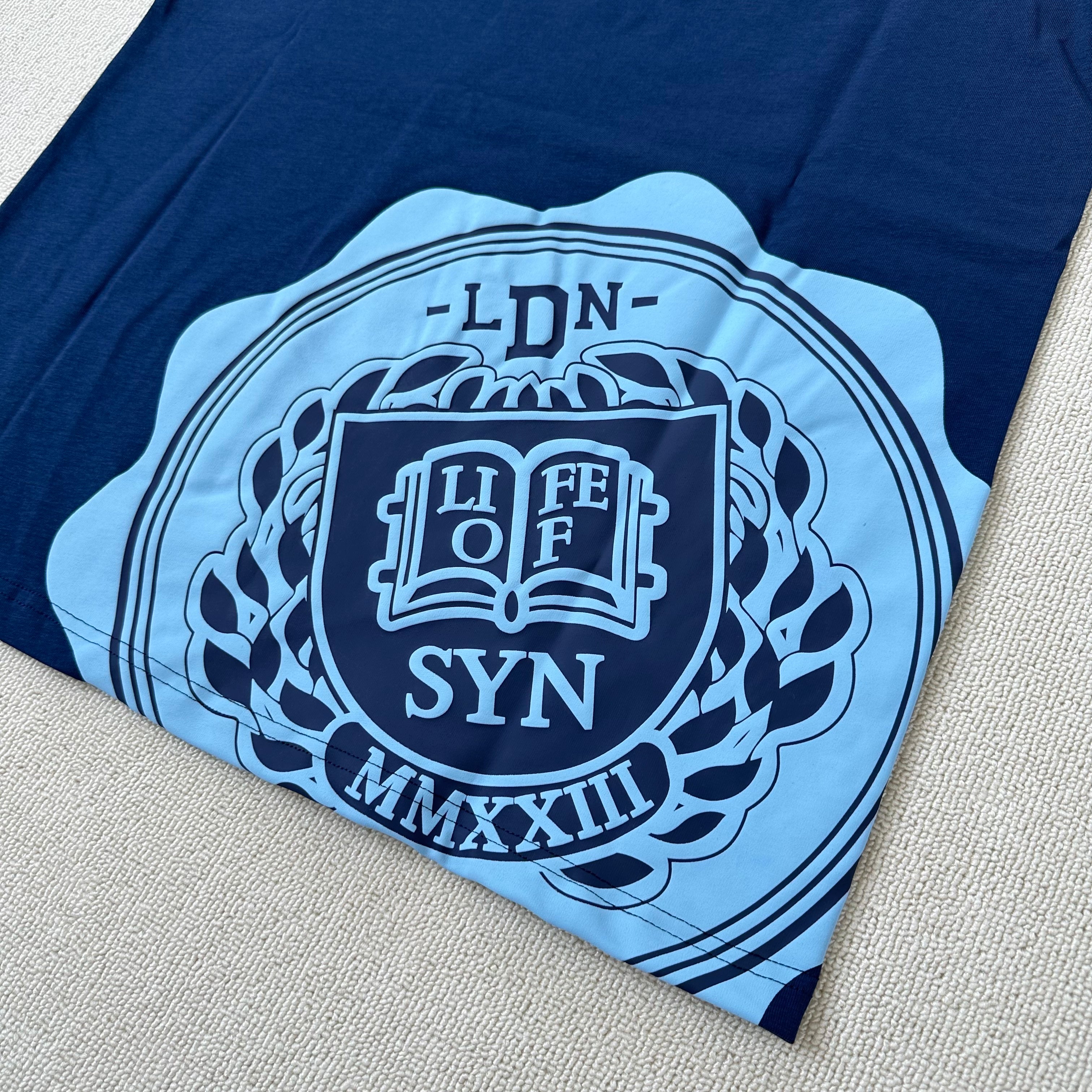 Syna World Crest Tee