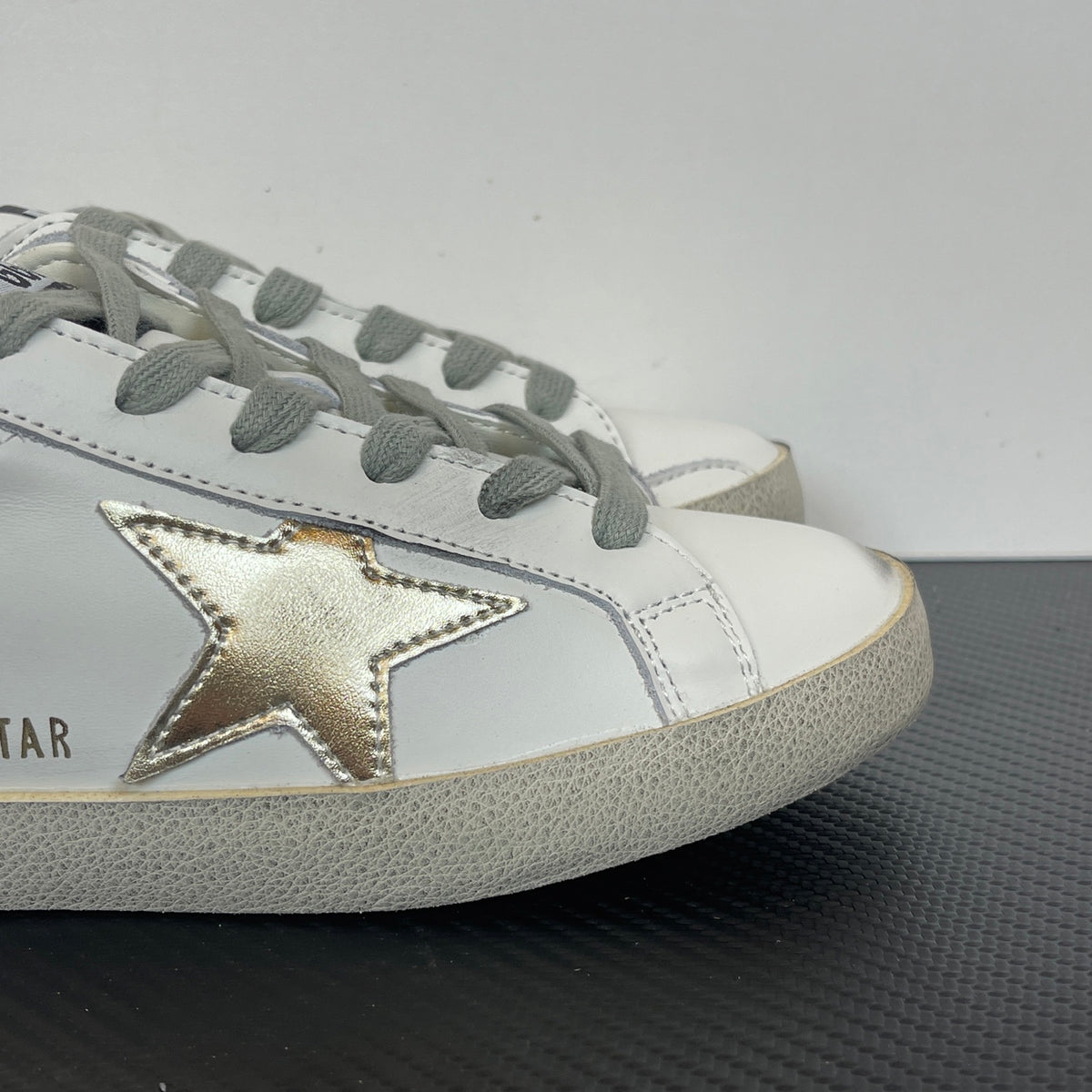 Women's Golden Goose Super-Star Golden Star and black glitter heels tab