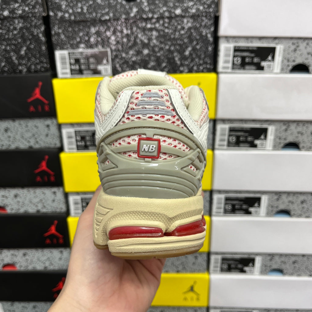 New Balance 1906R in "Sea Salt / True Red"