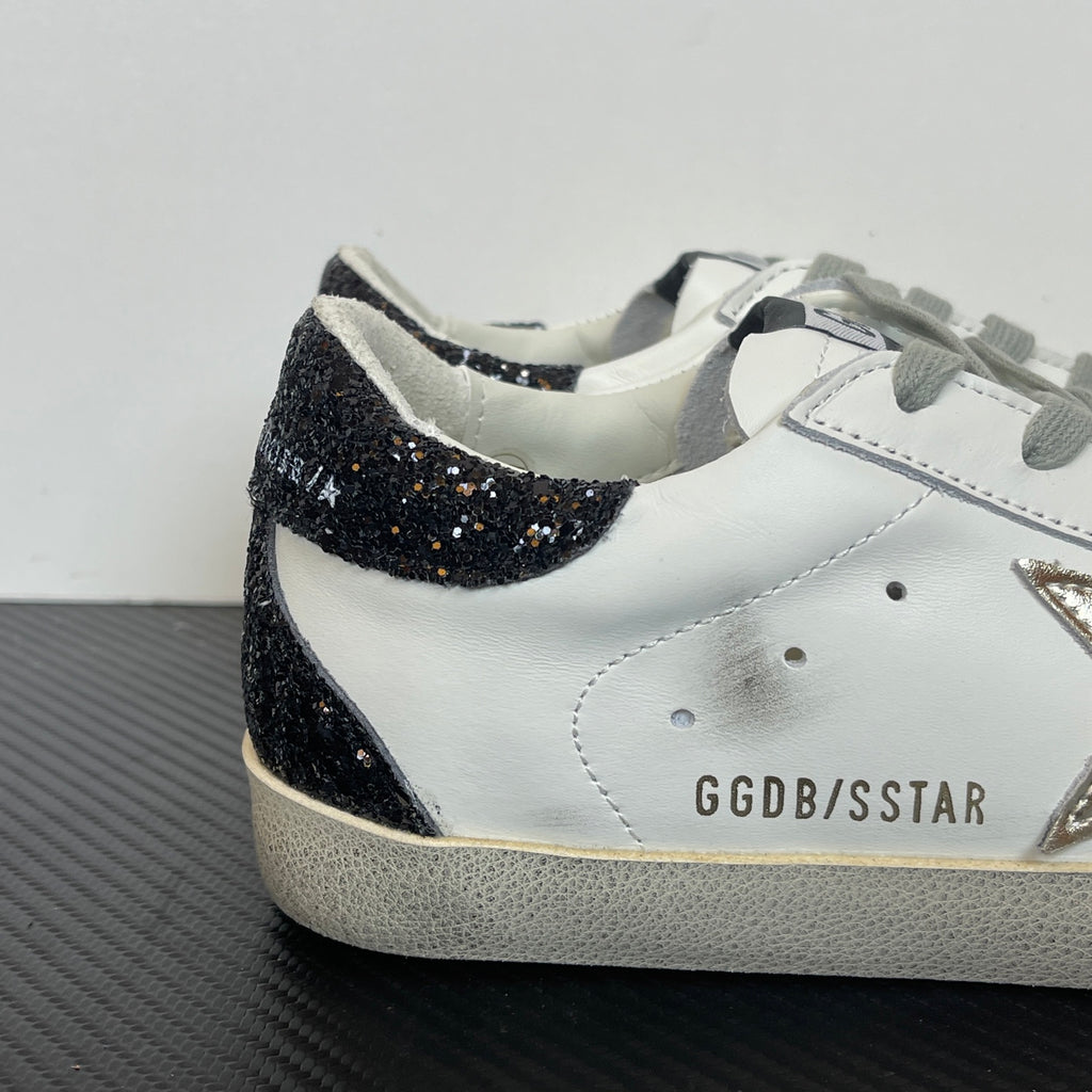 Women's Golden Goose Super-Star Golden Star and black glitter heels tab