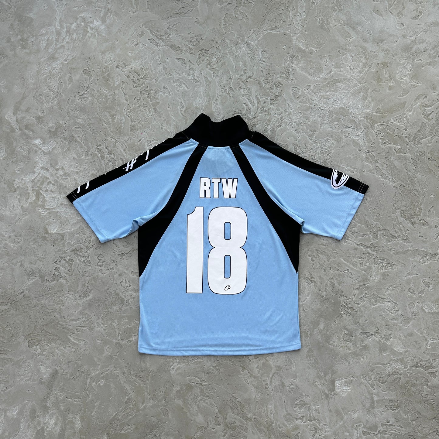 Corteiz Blue Panel Jersey Tee