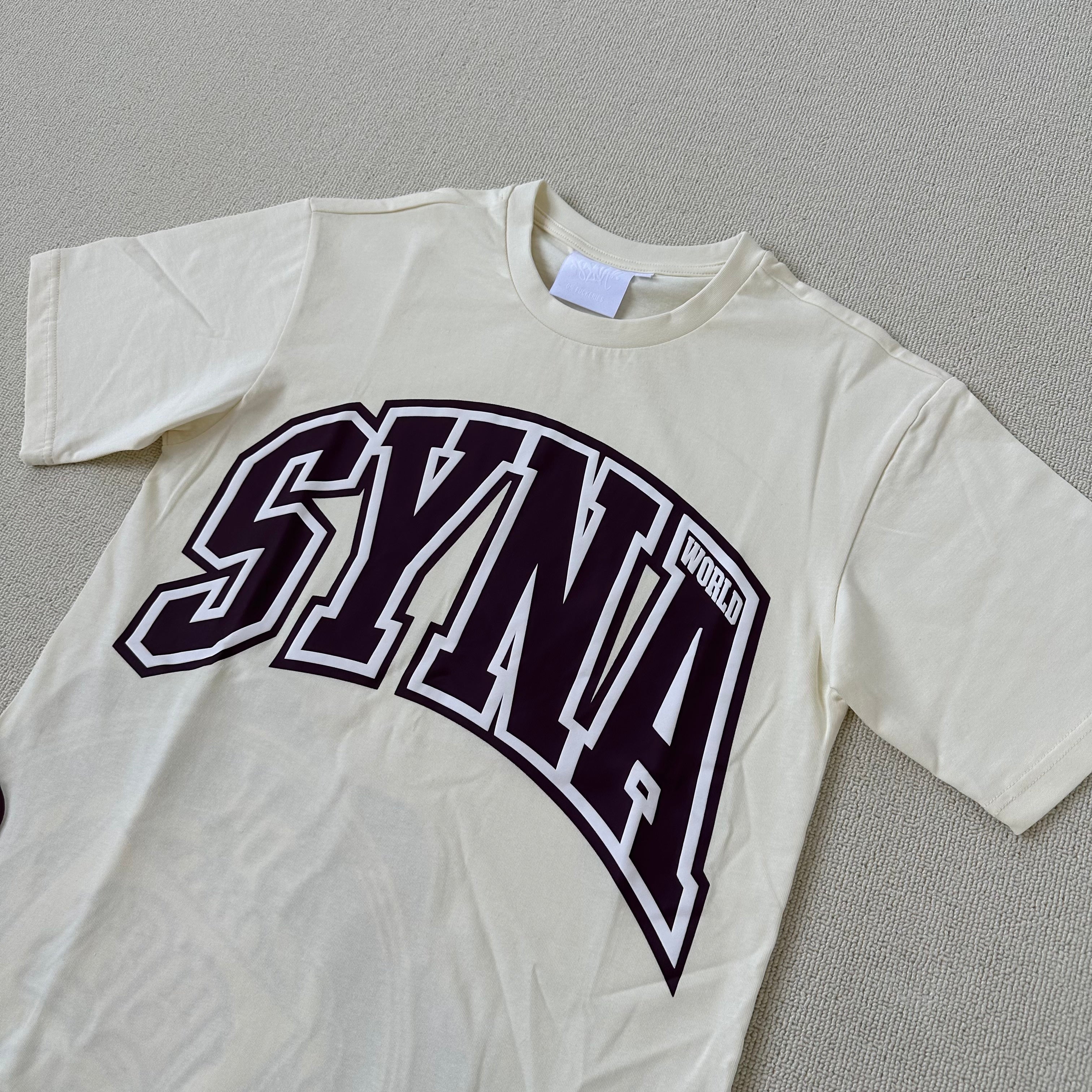 Syna World Crest Tee