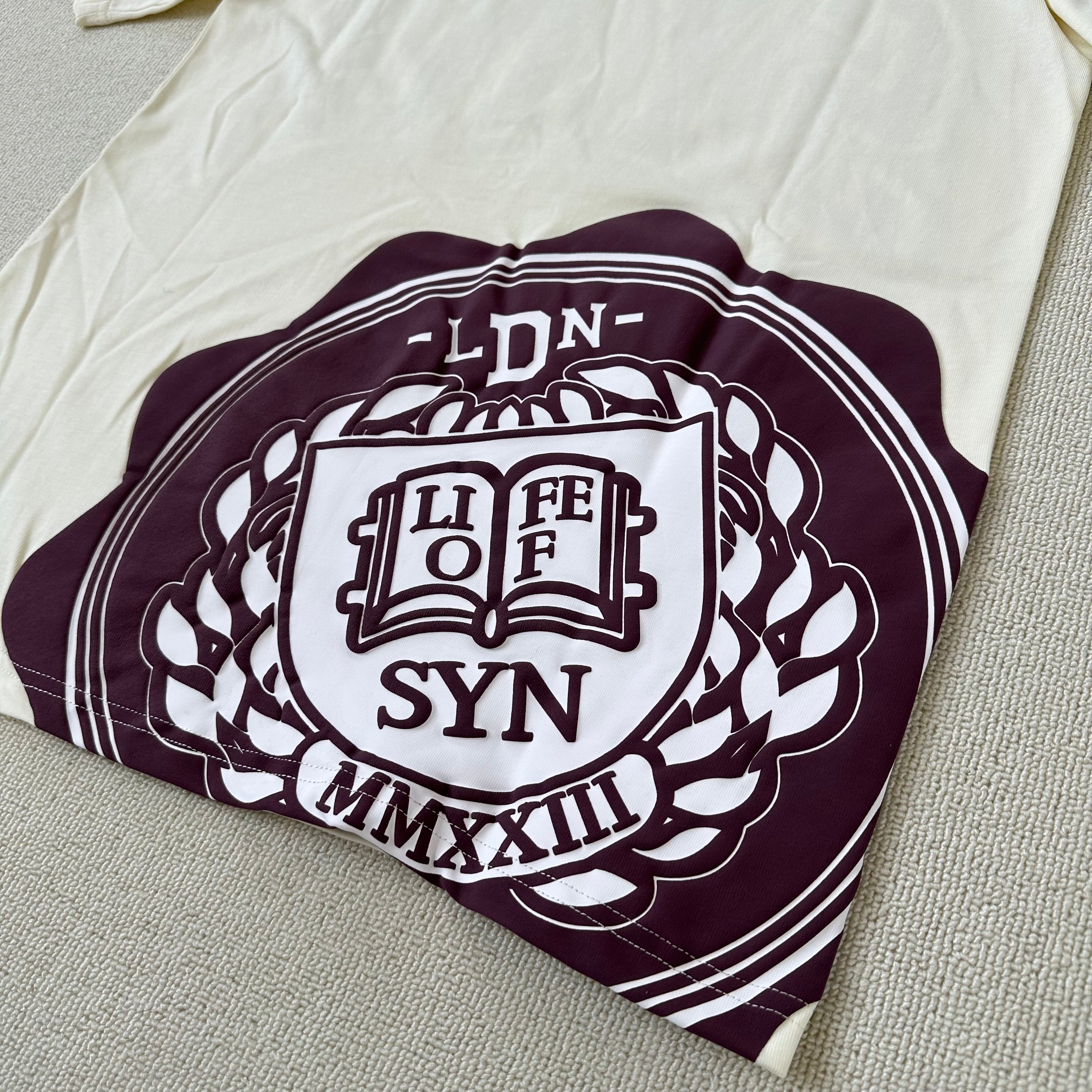 Syna World Crest Tee